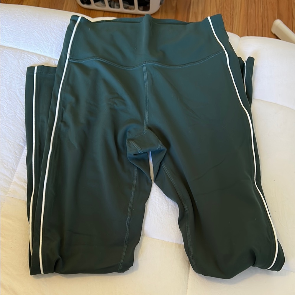 Green and white striped leggings